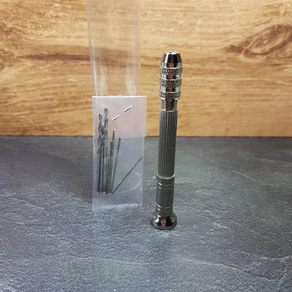 Metal hand drill including 10 drill bits